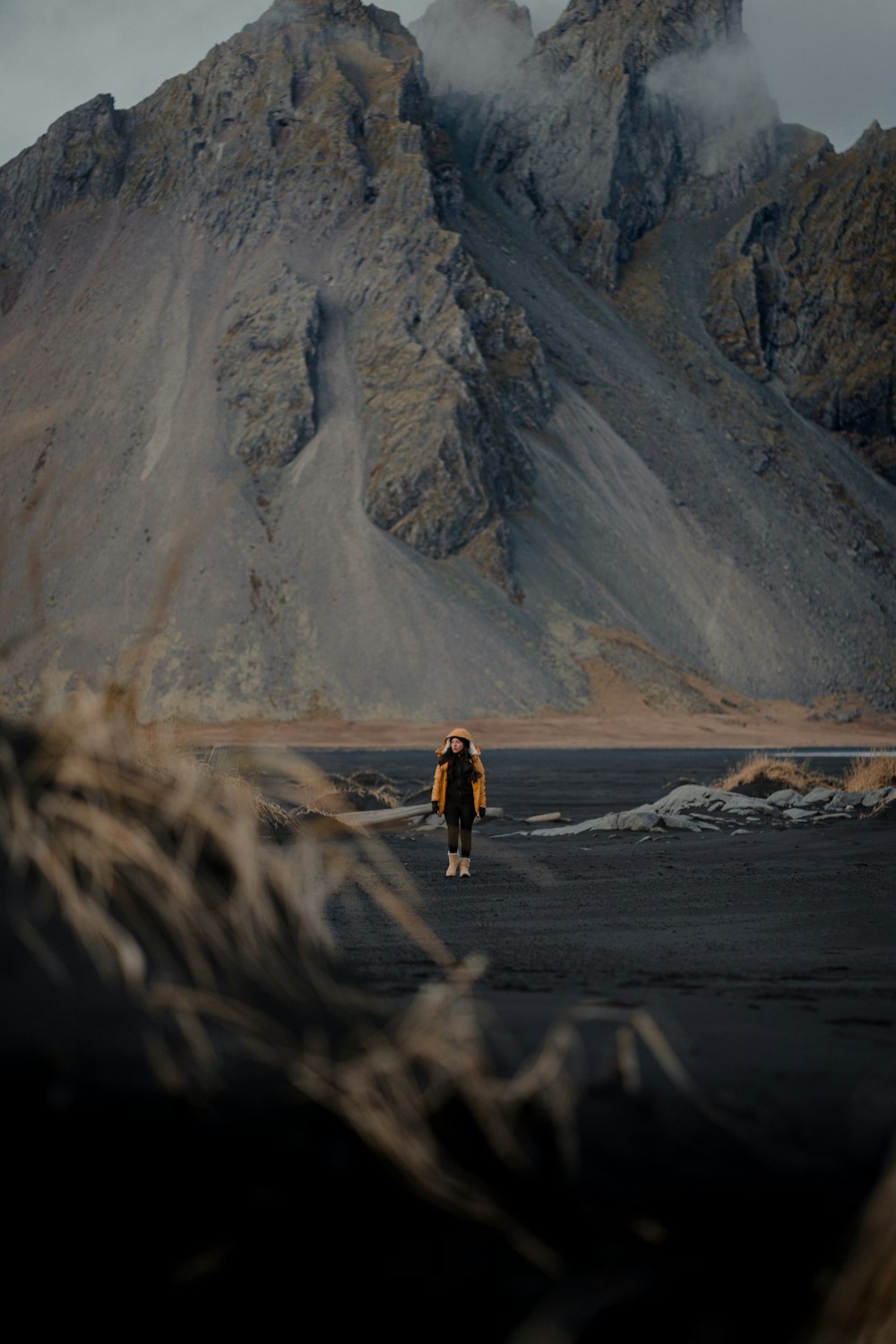 a person walking on a beach