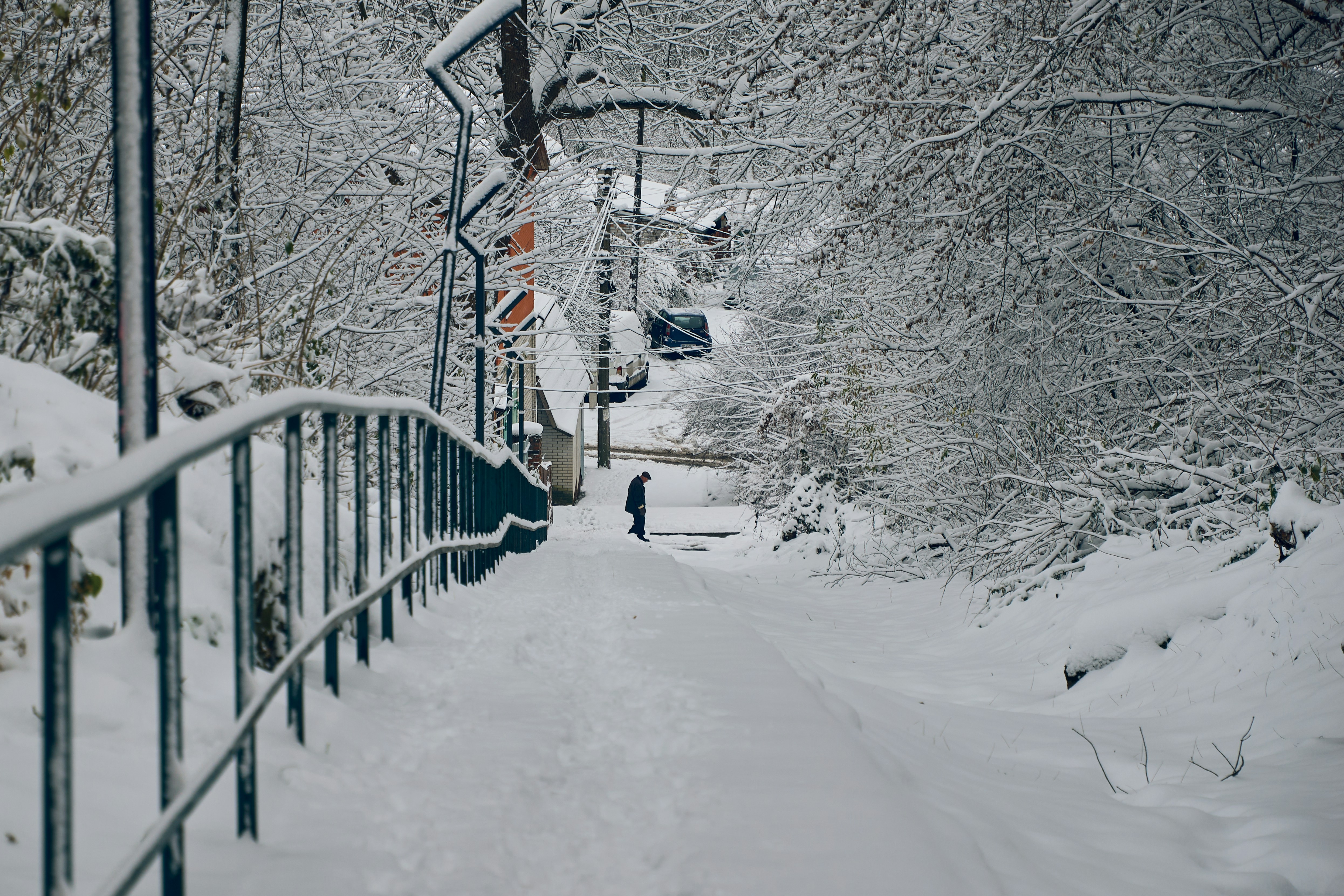 Person walking on snowy road