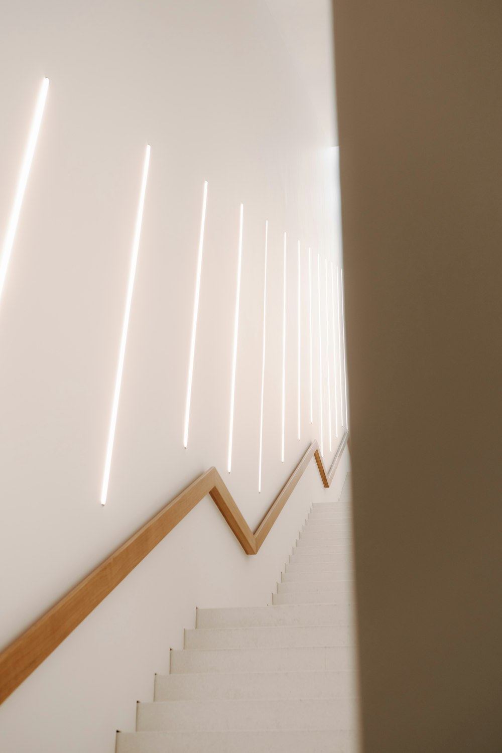 a staircase with white walls
