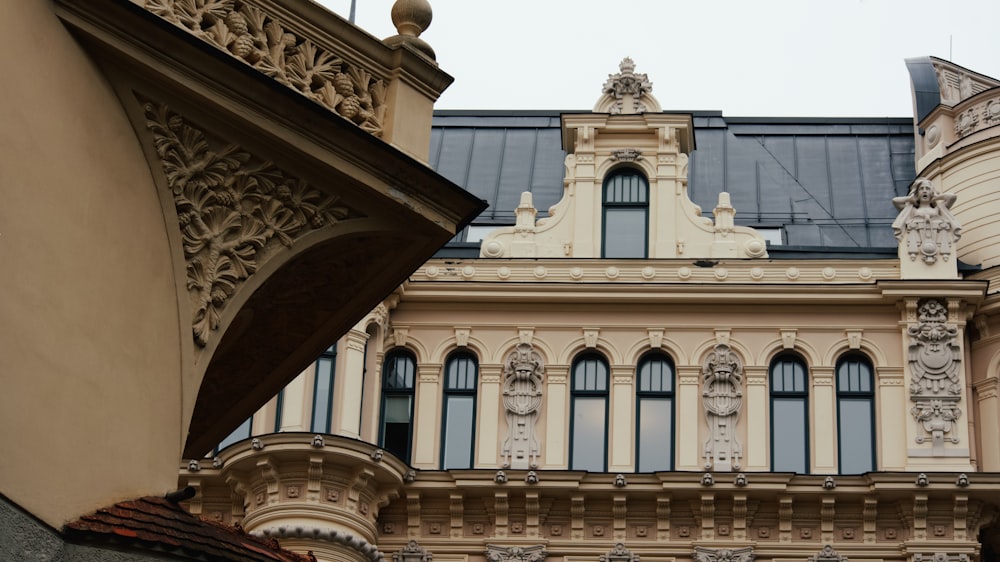 a building with statues on the front