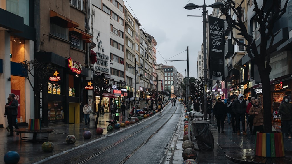 a busy street with people walking