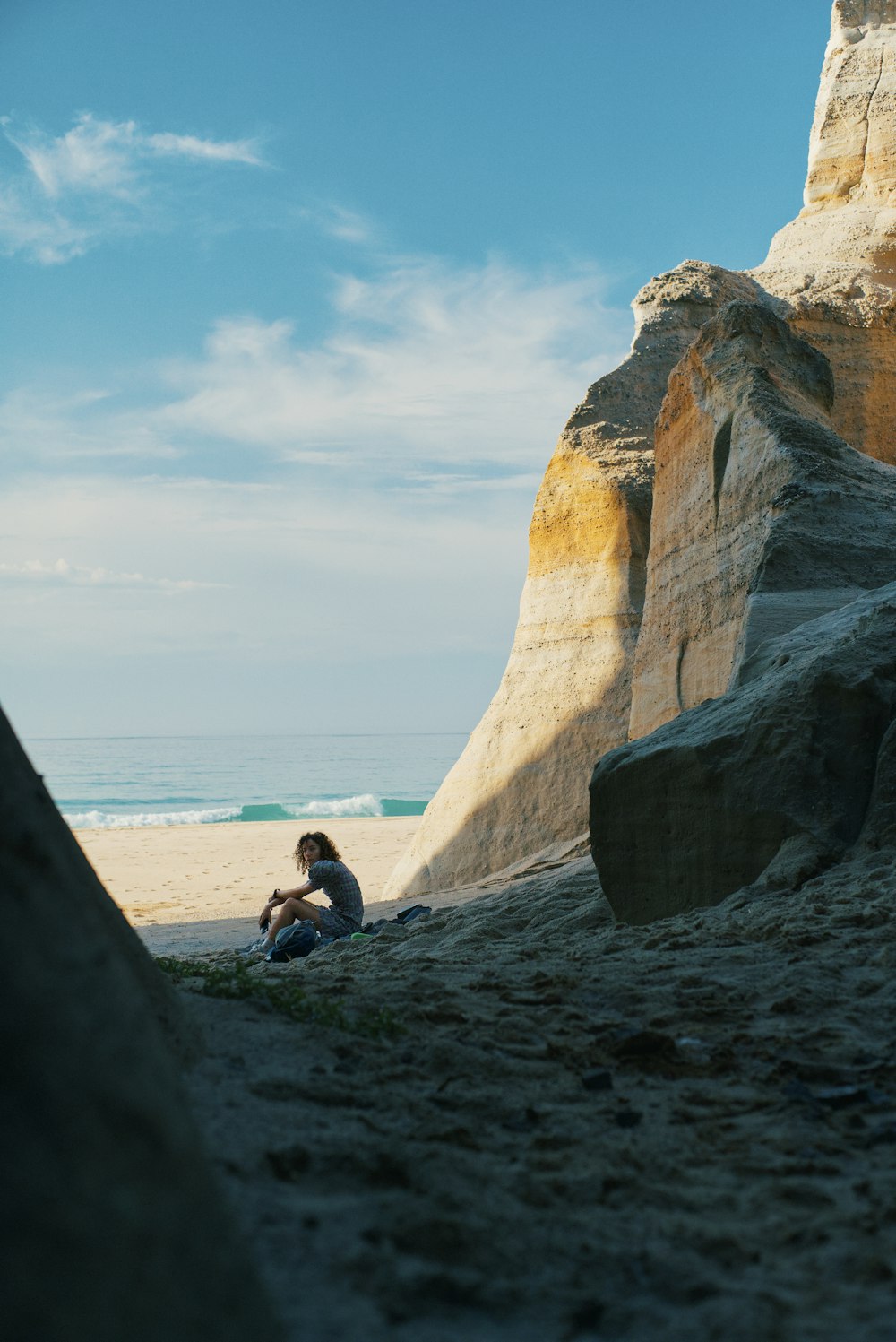 a person sitting on a beach