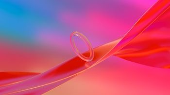 A futuristic abstract design featuring a wavy, ribbon-like structure in bright red and pink hues, with a translucent ring floating in the center. The background is a gradient of soft blues and pinks.