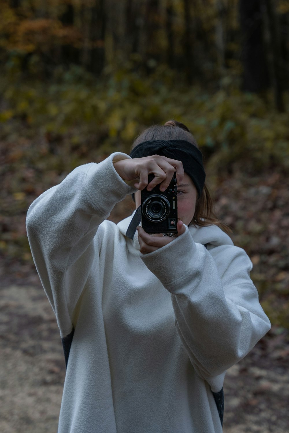 a person holding a camera