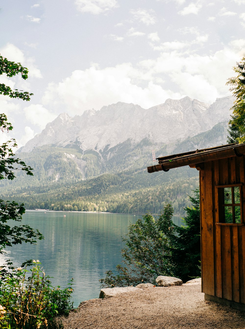 a lake with mountains in the background