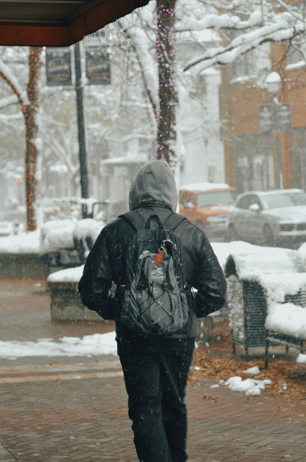 a person walking on a sidewalk