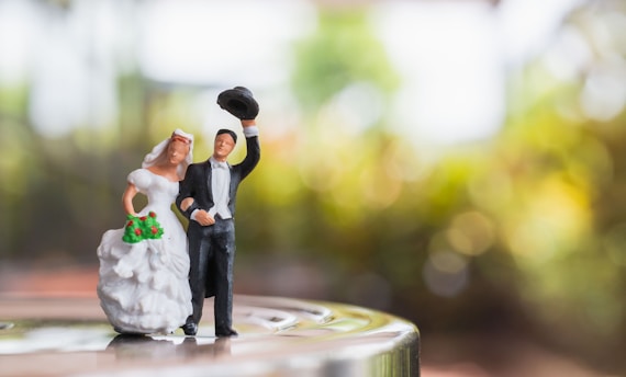 a man and woman in wedding attire
