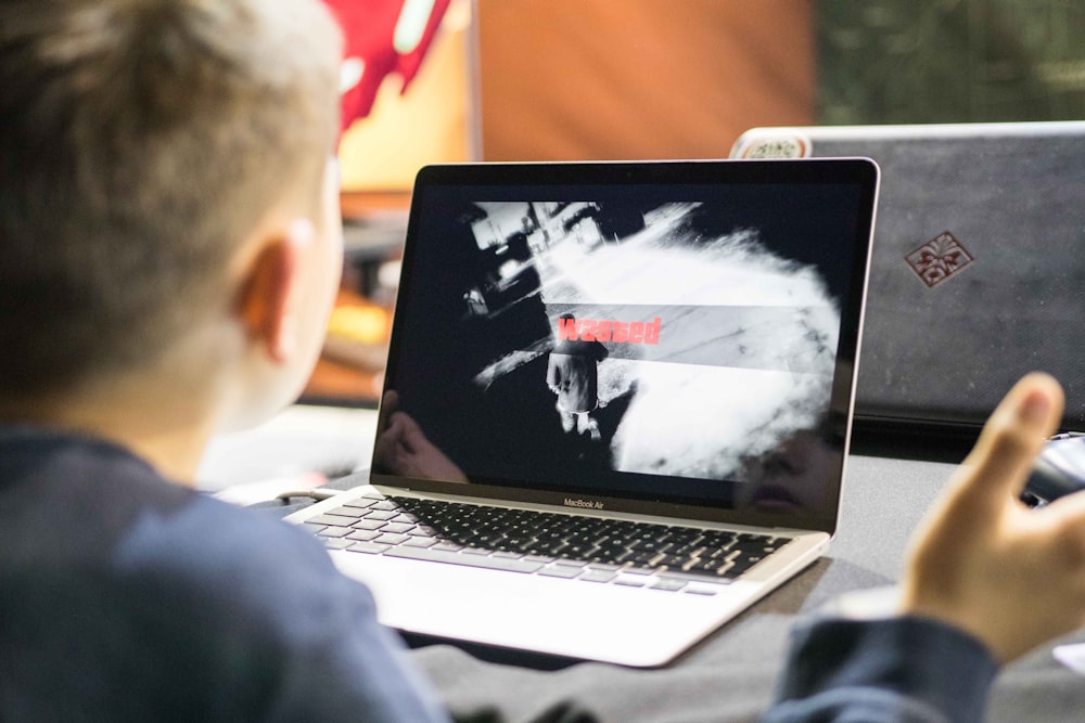 a man using a laptop