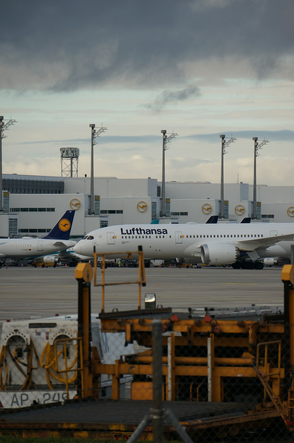 a couple of airplanes at an airport