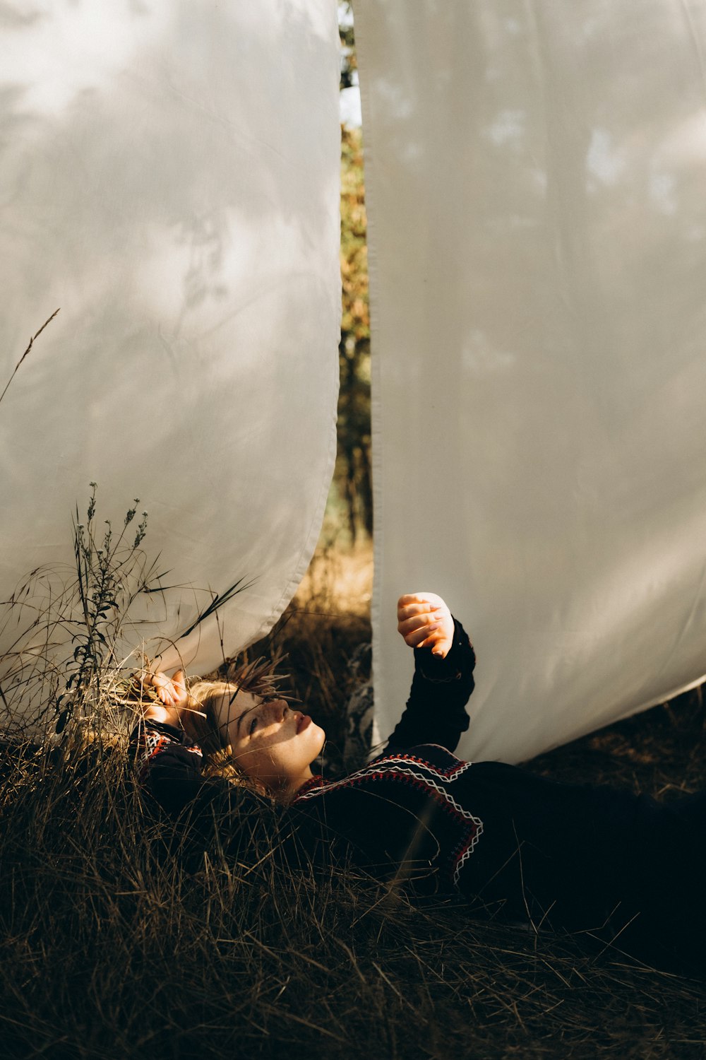 a man lying in the grass