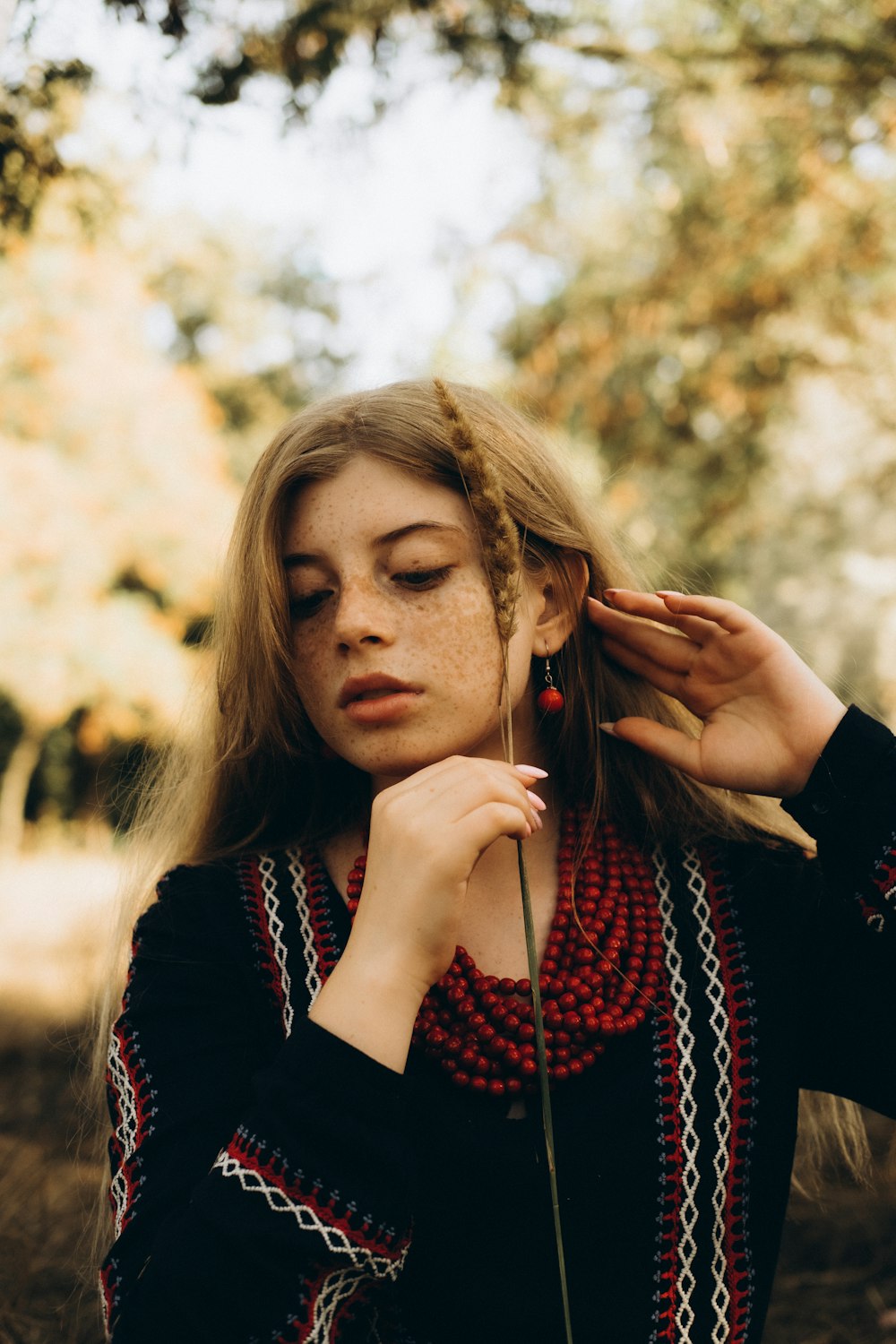 a woman with her hands on her face