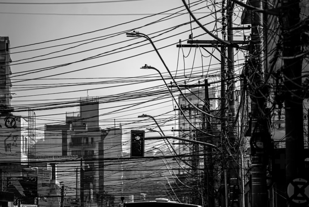 a city street with telephone wires