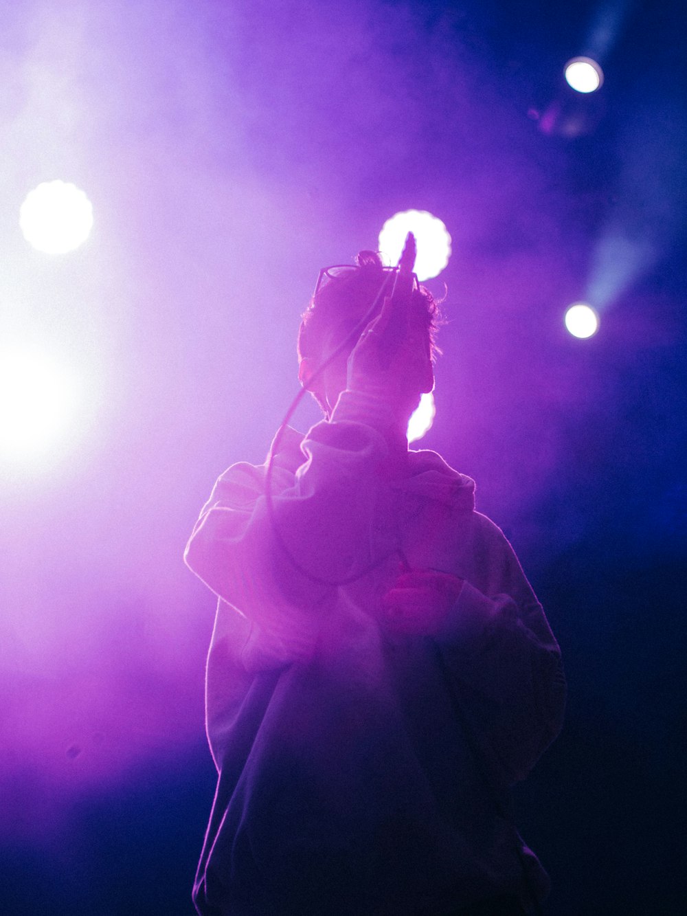 a person holding a microphone