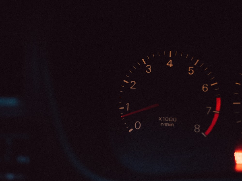 a car dashboard with a black background