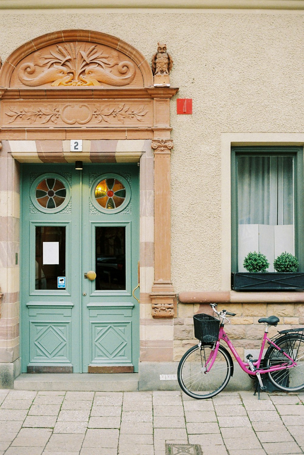 a bicycle parked in front of a building