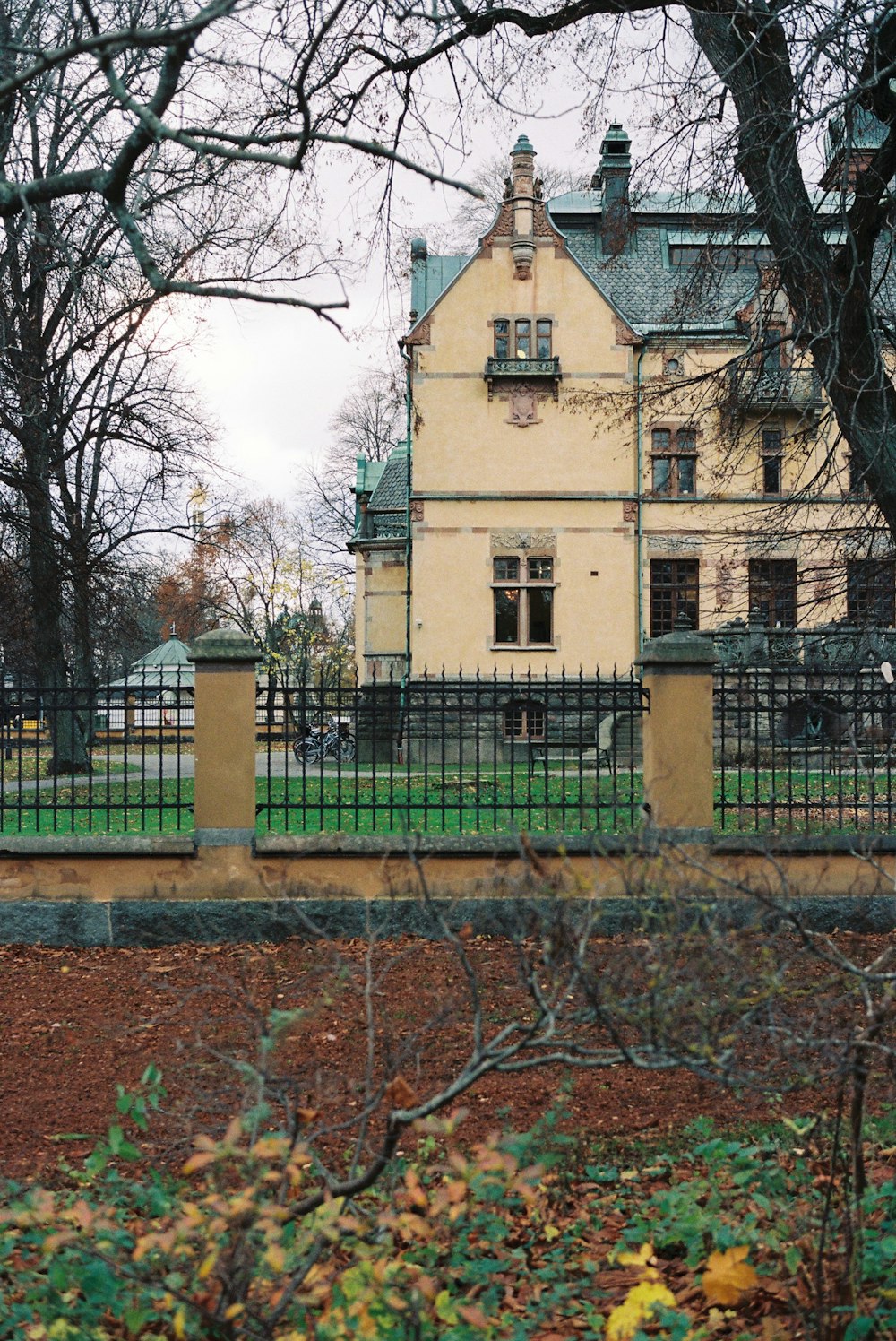 a large building with a black gate