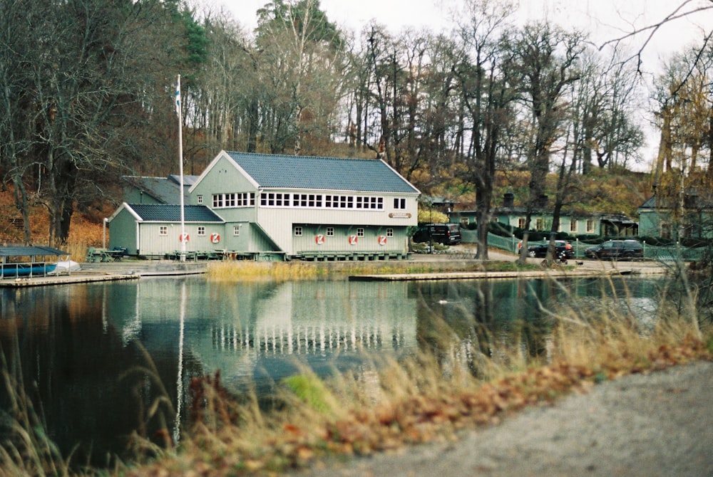 a building next to a body of water