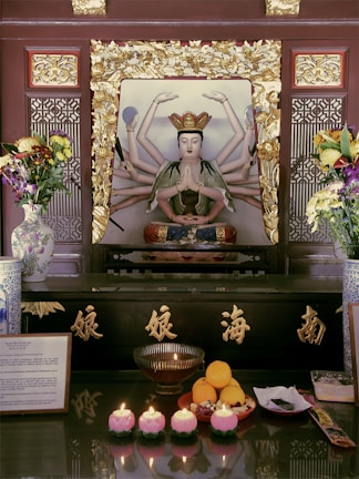 A serene altar adorned with candles and spiritual statues representing love and prosperity.