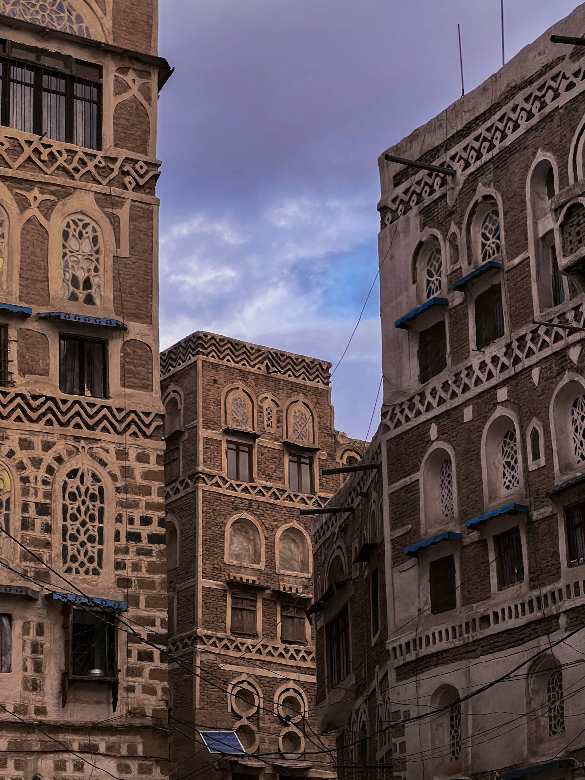 a group of buildings with windows