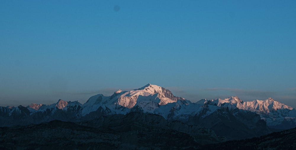 a mountain range with snow