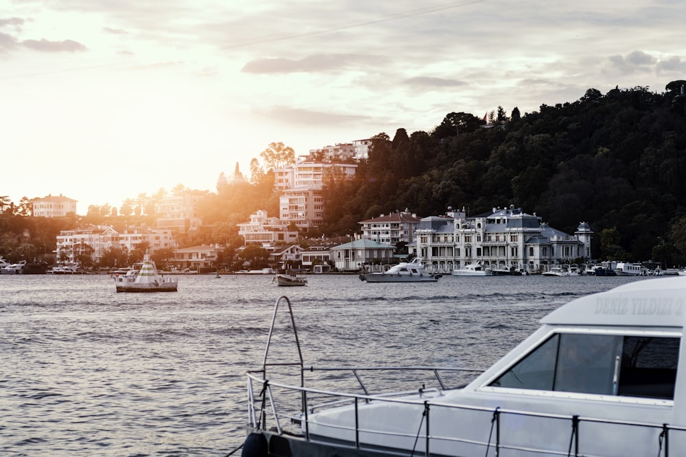 a body of water with boats and buildings along it