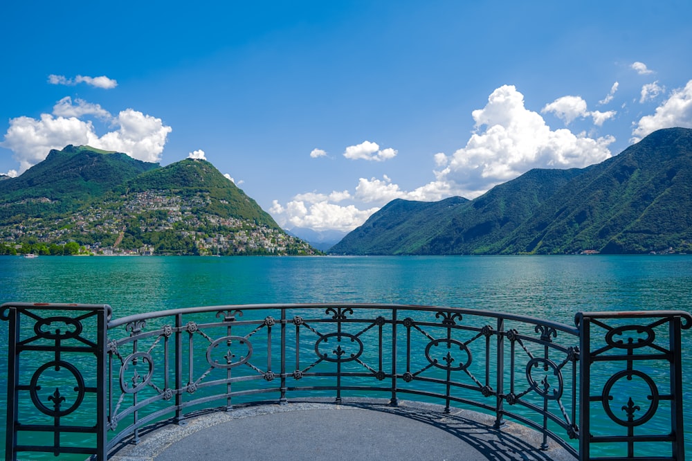 a body of water with mountains in the background