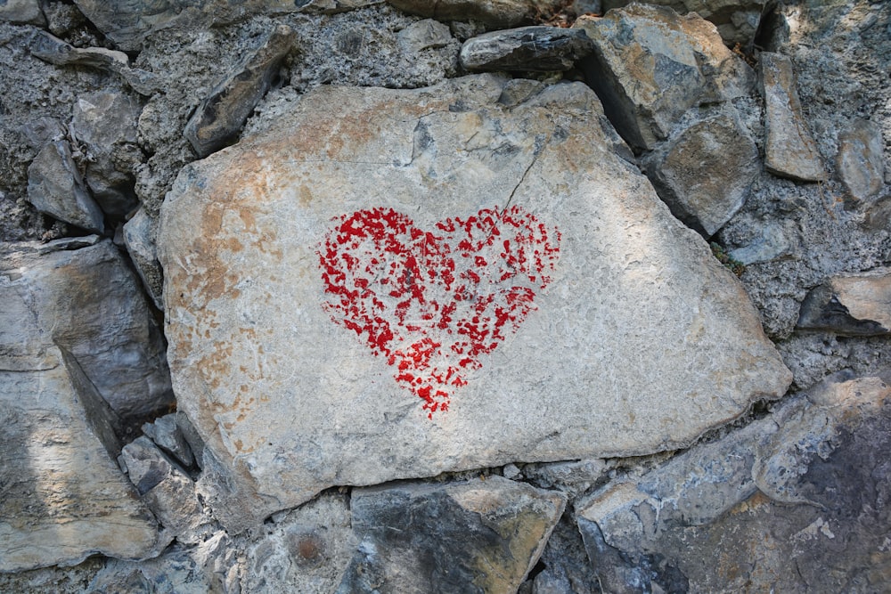 a rock with a heart carved into it
