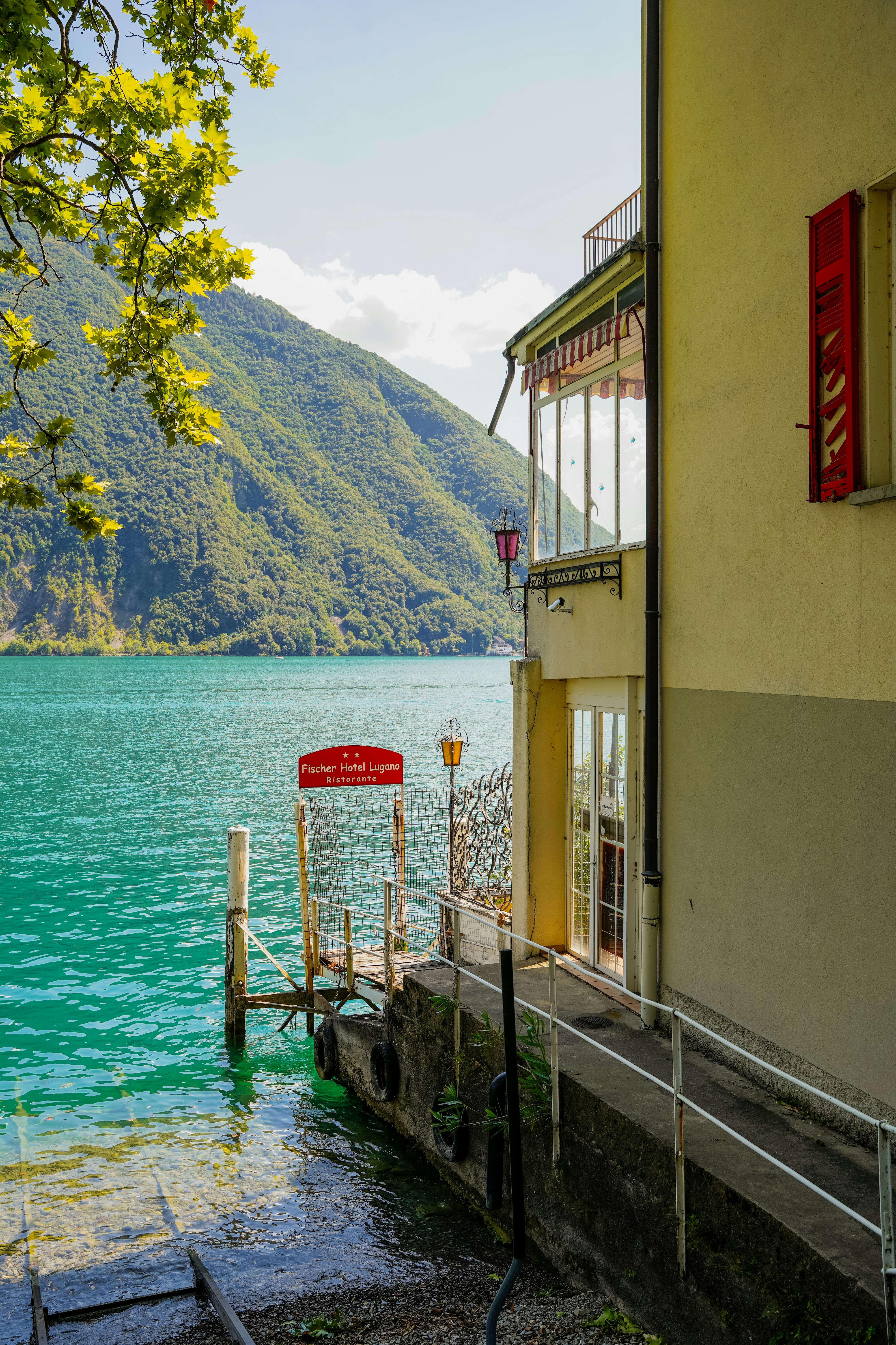 a building next to a body of water