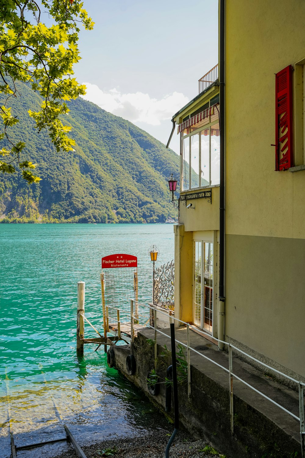 a building next to a body of water