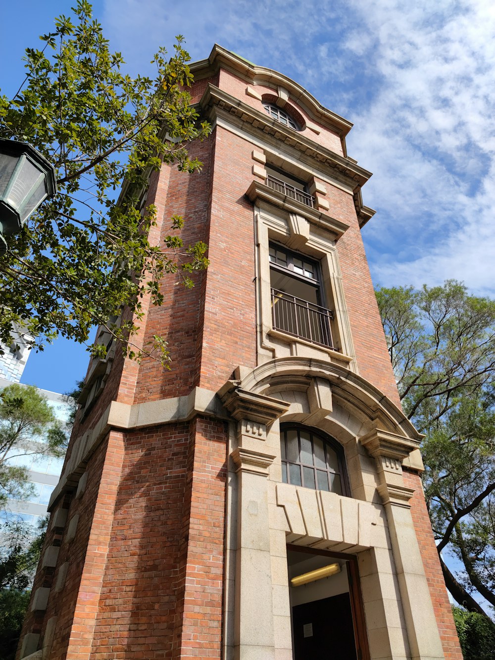 a brick building with a balcony