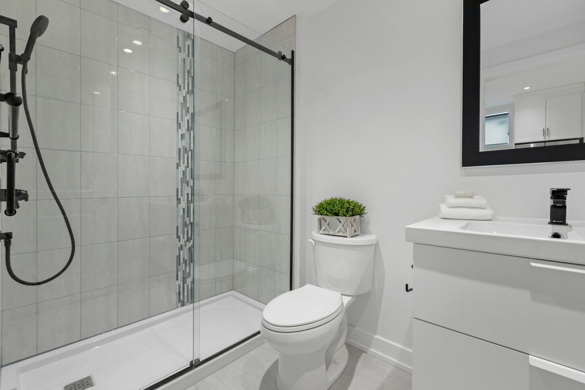 a bathroom with a glass shower