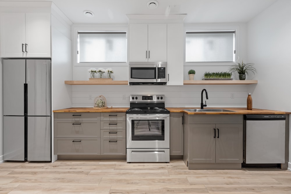 a kitchen with white cabinets