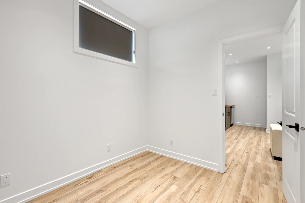 Bright room with a finished wood floor