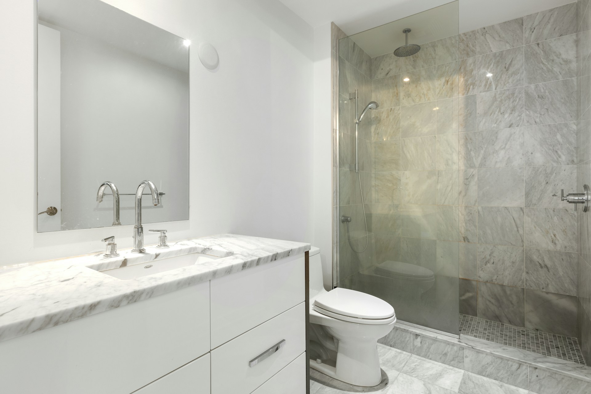 a bathroom with a glass shower