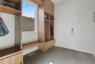 Cozy entryway bench with soft cushions and hidden storage compartments beneath