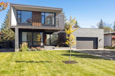 a house with a tree in the front yard