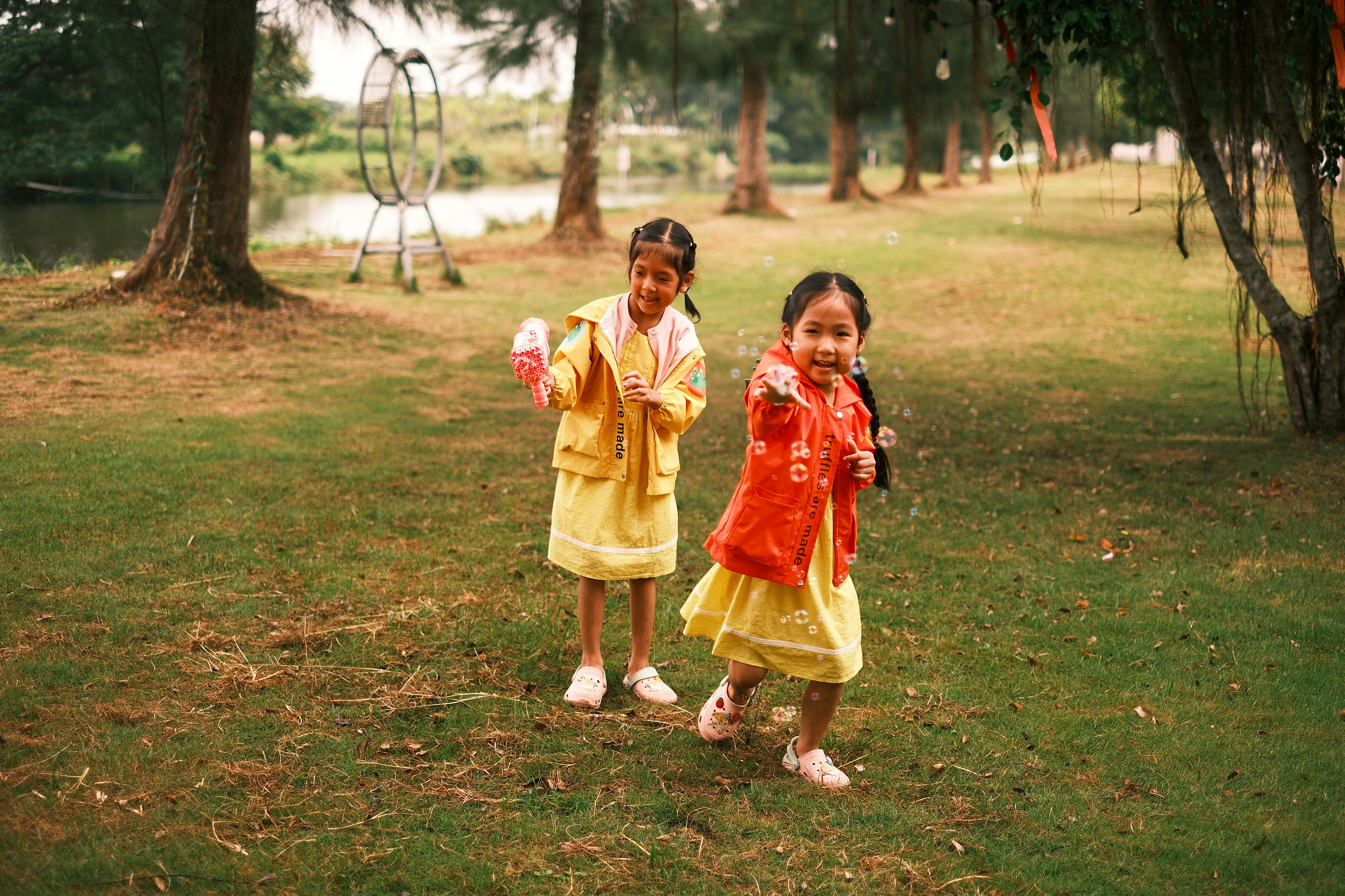 A picture of siblings playing or smiling together from their childhood.