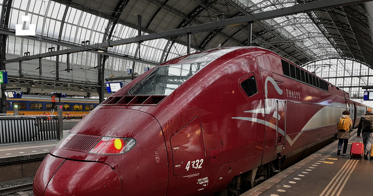 Red Train Check Train A red train at a train station photo – Free Vehicle Image on Unsplash
