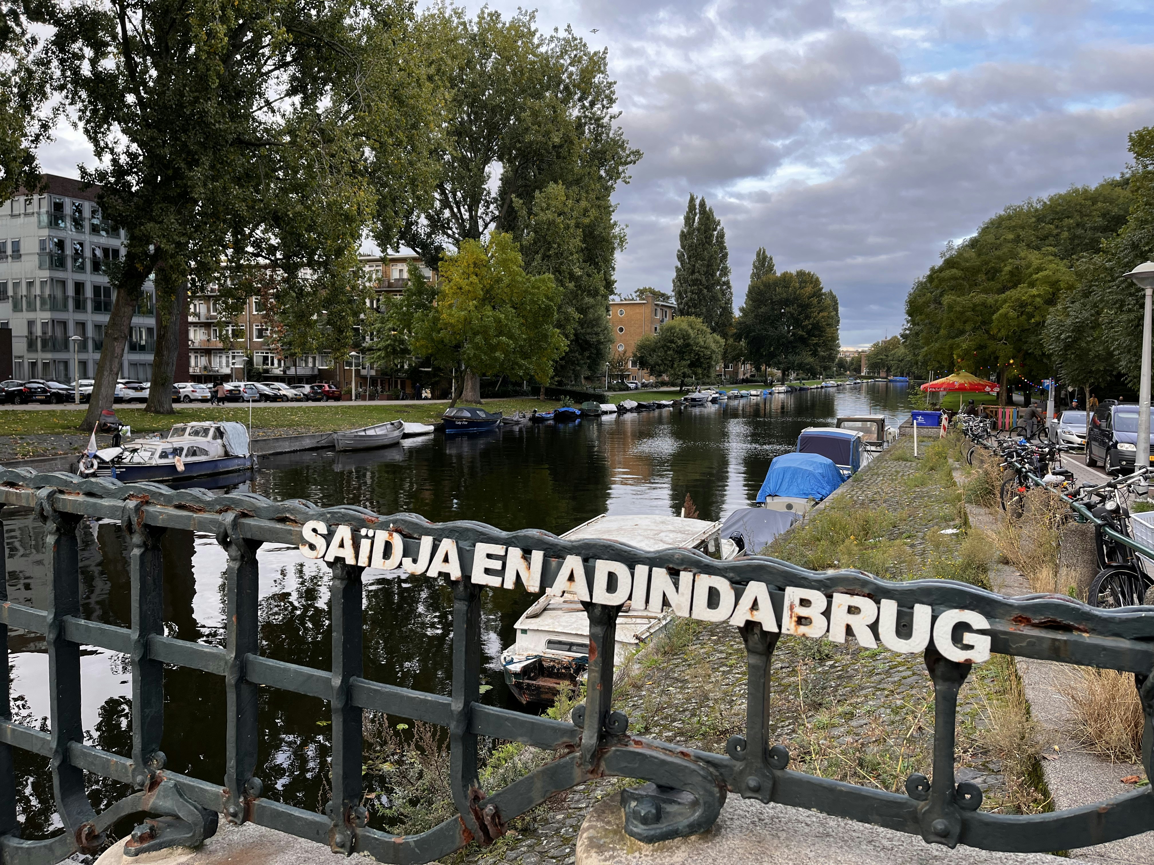 a body of water with boats in it and buildings around it