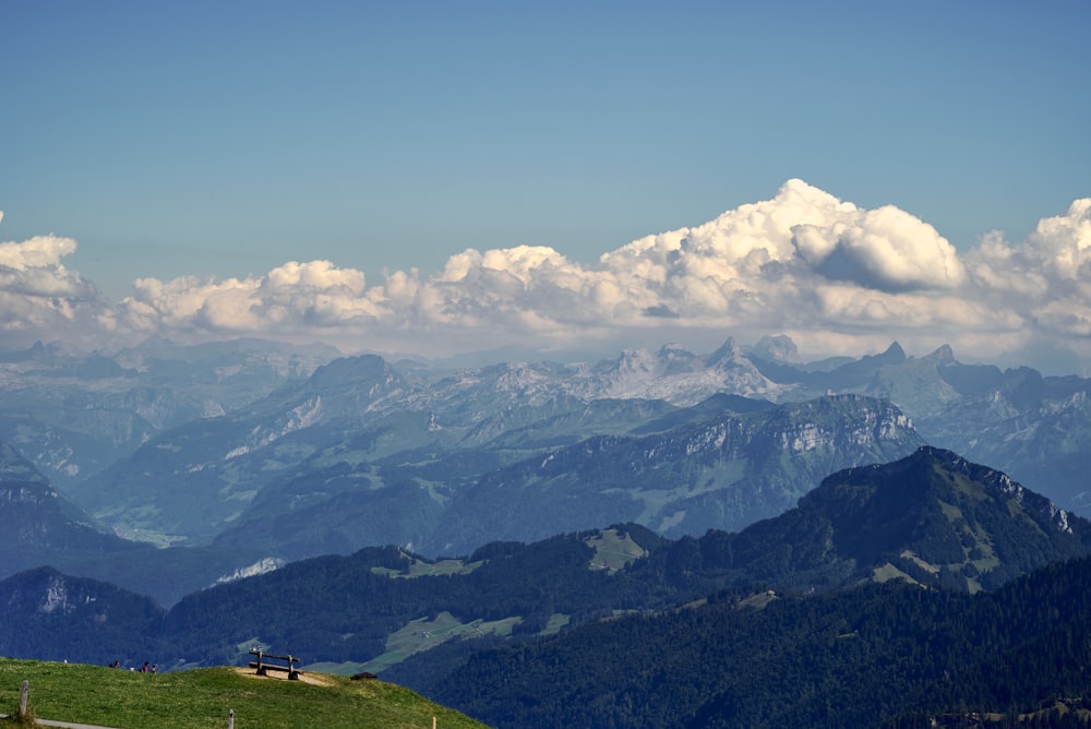 a mountain range with clouds