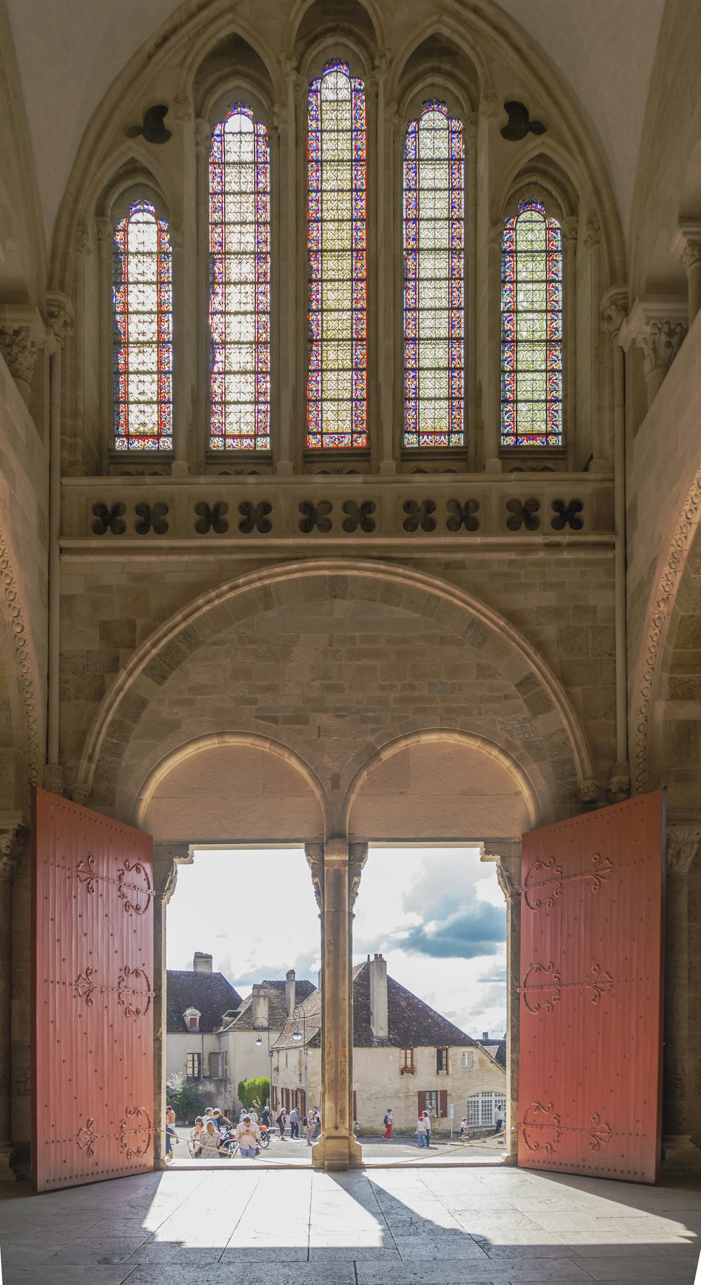 a large arched doorway with many windows