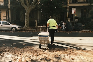 a man pushing a cart
