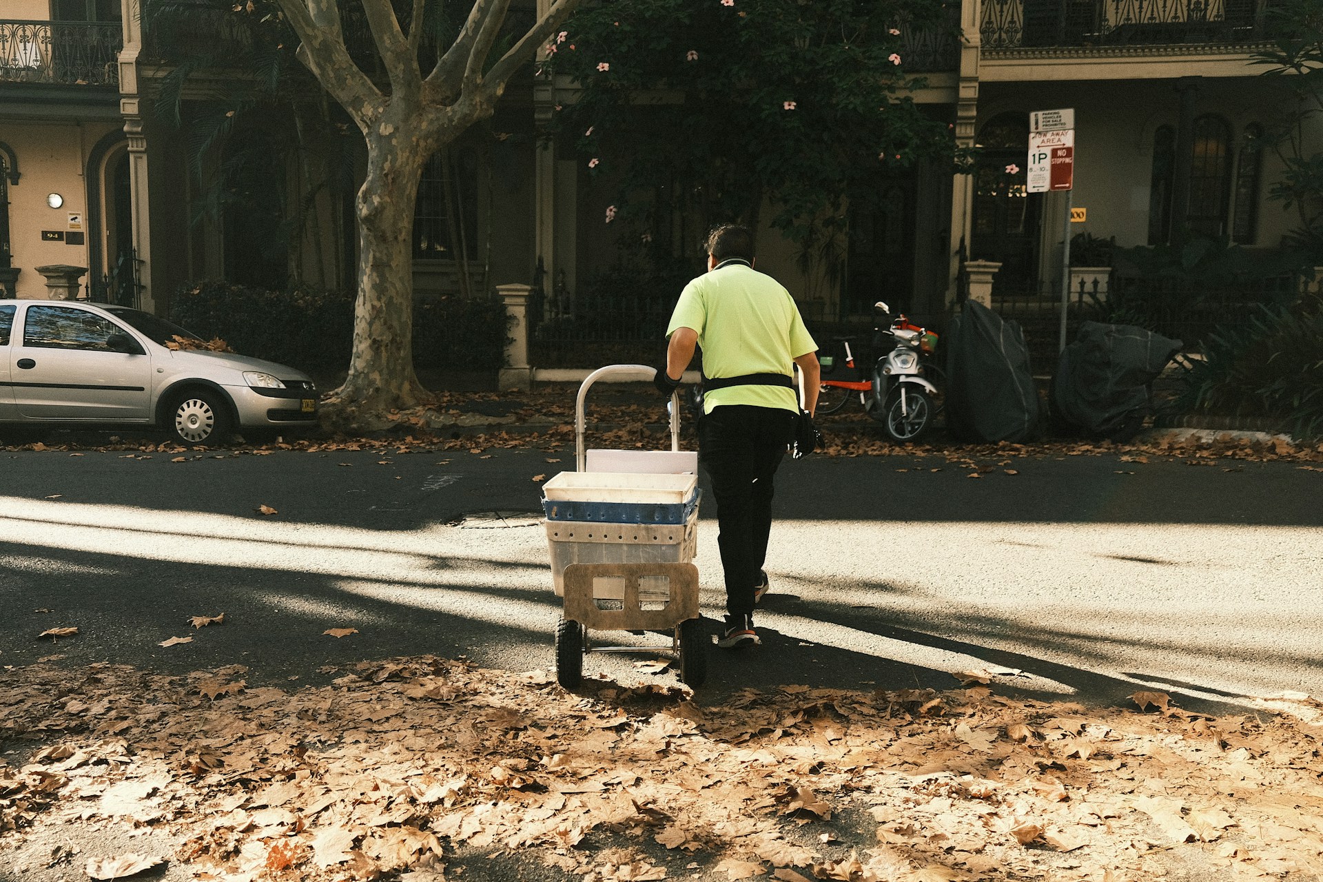 a man pushing a cart