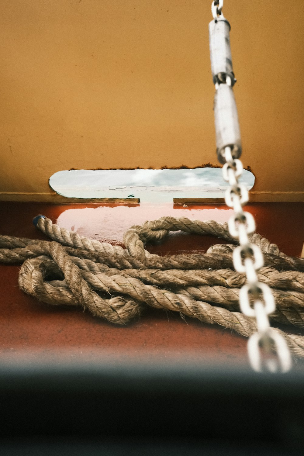 a rope on a wooden surface