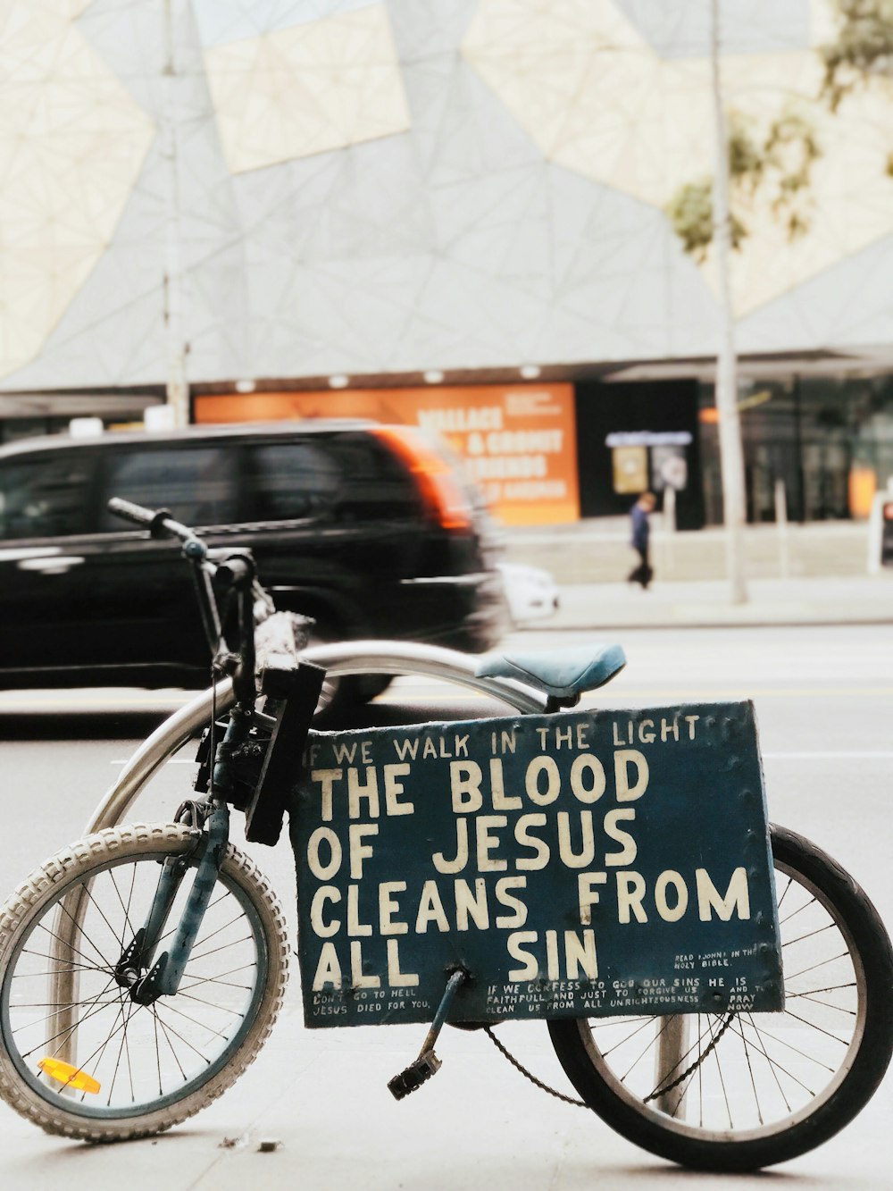 a bicycle with a sign on it
