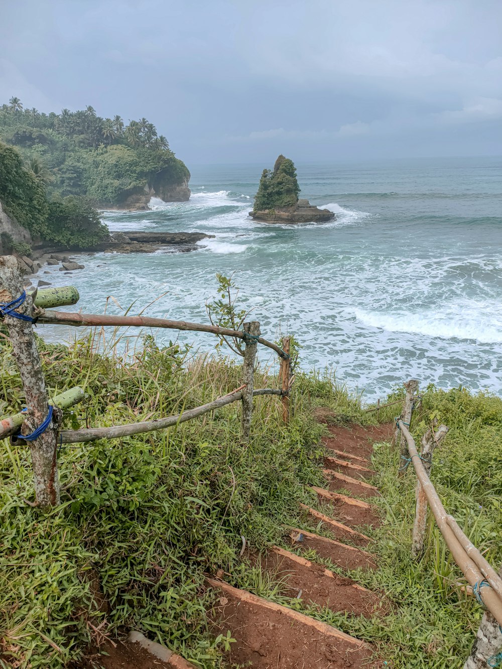 a stairway leading to a beach