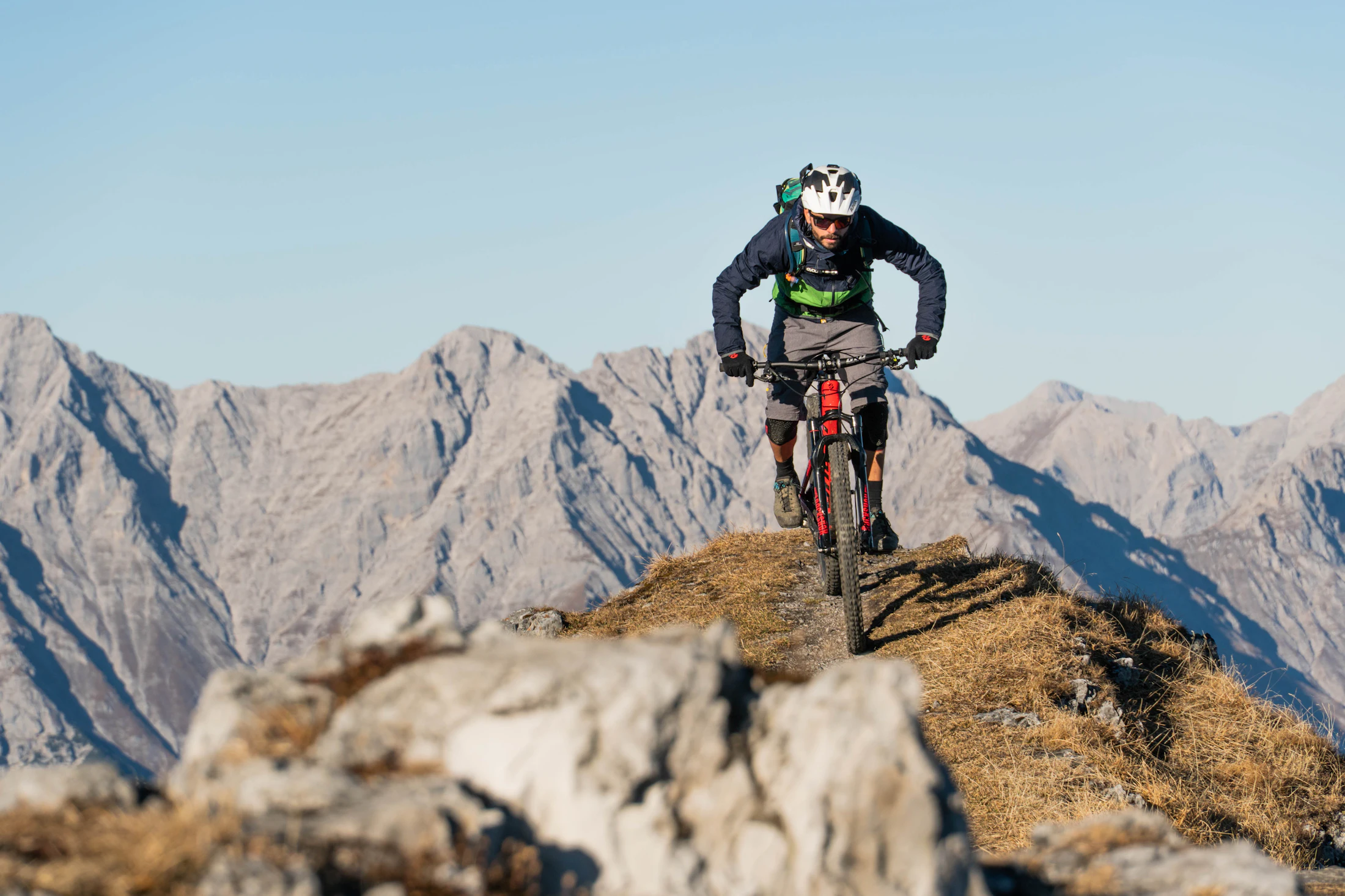 Rider on a mountain ridge trail