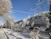 Snow-covered streets in downtown Coquitlam with clear sidewalks after professional snow clearing.