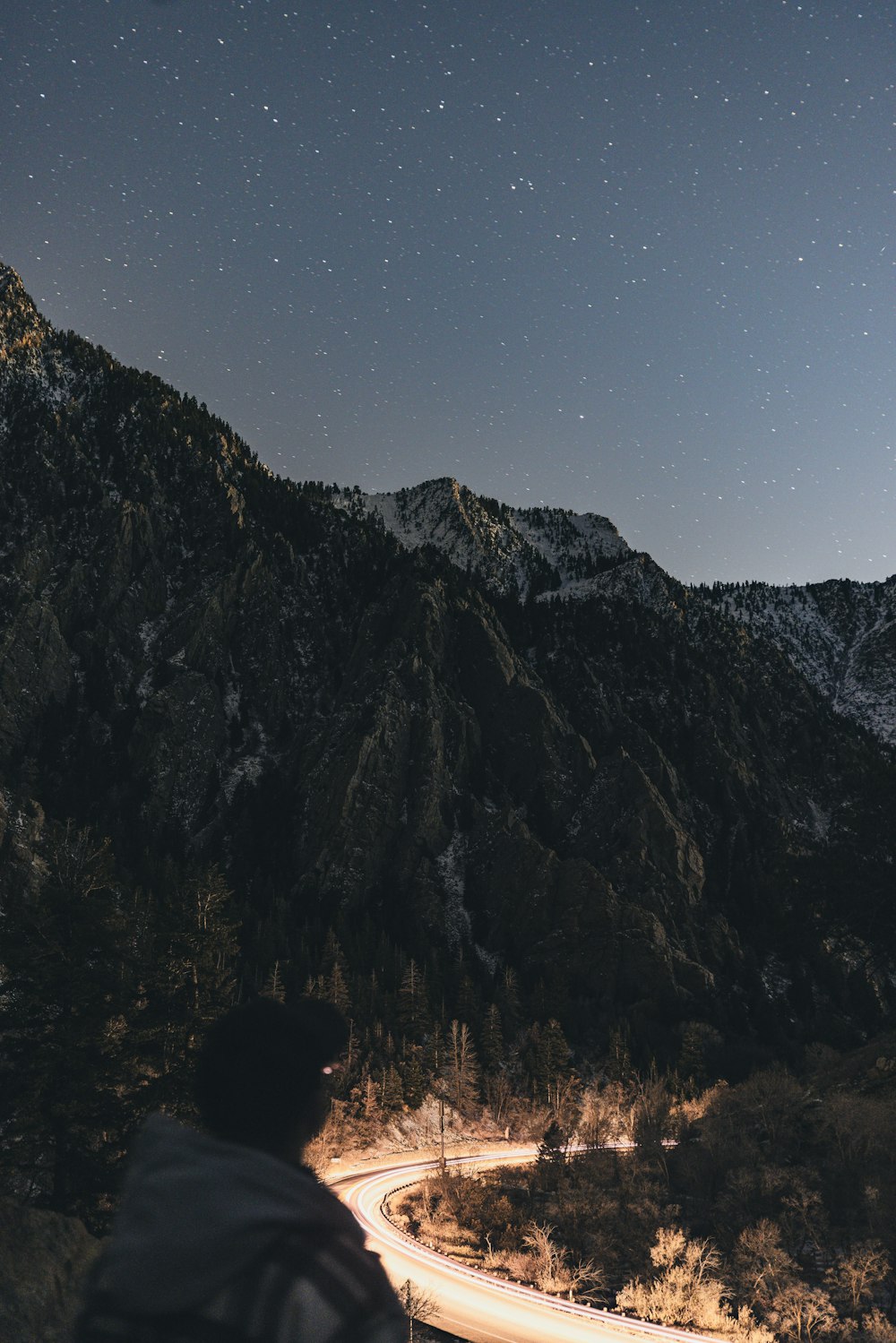 a person looking at a mountain