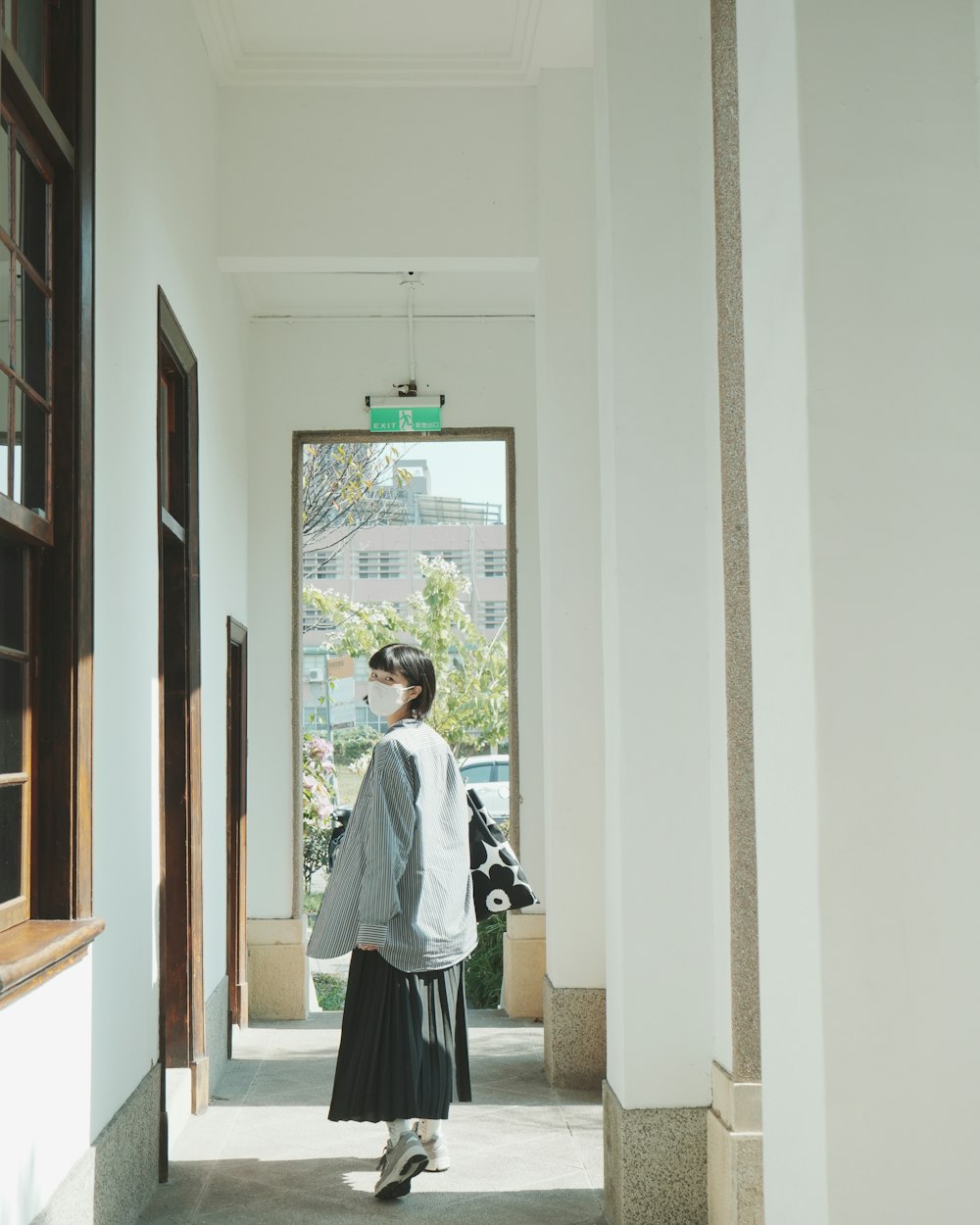 a man walking through a building